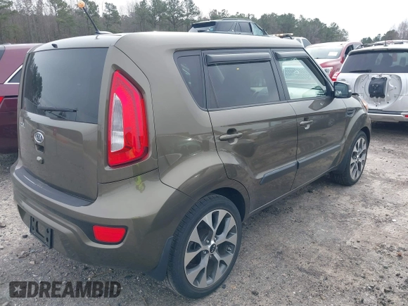 2012 Kia Soul + with VIN KNDJT2A62C7465580, listed as a IAAI auction lot 41717664 with 70,699 mi miles. Bid and sale history available at carsss.com. Image 4.