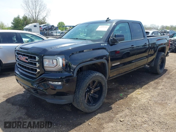 2017 GMC Sierra 1500 SLE z VIN 1GTV2MEC2HZ105964, wystawiony jako IAAI lot #42091941 z przebiegiem 93 779 mil mil oraz . Historia ofert i sprzedaży dostępna na DreamBid. Obrazek 2.