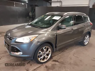 2014 Ford Escape Titanium with VIN 1FMCU9JX0EUE45254, listed as a IAAI auction lot 42038700 with 60,103 mi miles. Bid and sale history available at carsss.com. Image 2.