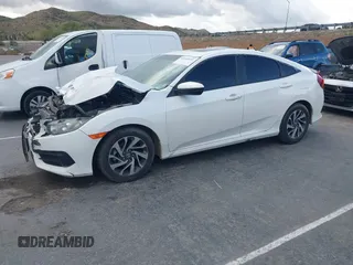 2018 Honda Civic EX with VIN 19XFC2F76JE206191, listed as a IAAI auction lot 41949231 with 146,118 mi miles and . Bid and sale history available at DreamBid. Image 14.