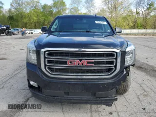 2015 GMC Yukon SLT with VIN 1GKS2BKC6FR145140, listed as a Copart auction lot 55451365 with 216,522 mi miles and Salvage Title. Bid and sale history available at DreamBid. Image 5.