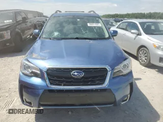 2017 Subaru Forester Touring with VIN JF2SJGTC2HH404923, listed as a Copart auction lot 58091885 with 101,317 mi miles and Salvage title. Bid and sale history available at DreamBid. Image 5.