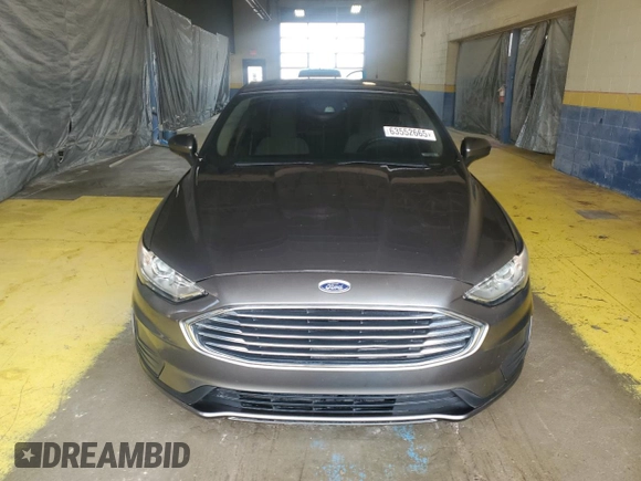 2020 Ford Fusion SE z VIN 3FA6P0HD4LR213055, wystawiony jako Copart lot #63552665 z przebiegiem 126 005 mil mil oraz Czysty tytuł • Clean title. Historia ofert i sprzedaży dostępna na DreamBid. Obrazek 5.