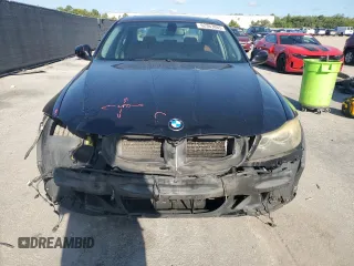 2009 BMW 3 Series 328i xDrive with VIN WBAPK73559A456475, listed as a Copart auction lot 62363865 with 169,125 mi miles and Salvage title. Bid and sale history available at DreamBid. Image 5.
