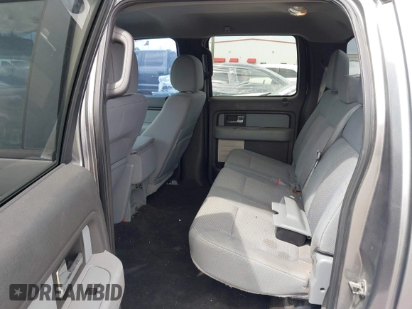 2013 Ford F-150 XL with VIN 1FTFW1CTXDFA78857, listed as a IAAI auction lot 42416880 with 215,031 mi miles and . Bid and sale history available at DreamBid. Image 8.