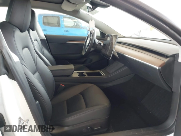 2023 Tesla Model 3 z VIN 5YJ3E1EA8PF412166, wystawiony jako IAAI lot #41461983 z przebiegiem 25 908 mil mil oraz . Historia ofert i sprzedaży dostępna na DreamBid. Obrazek 5.