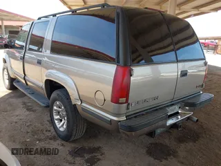1999 GMC Suburban with VIN 3GKFK16R8XG501843, listed as a IAAI auction lot 42467263 with Not provided miles and . Bid and sale history available at DreamBid. Image 3.