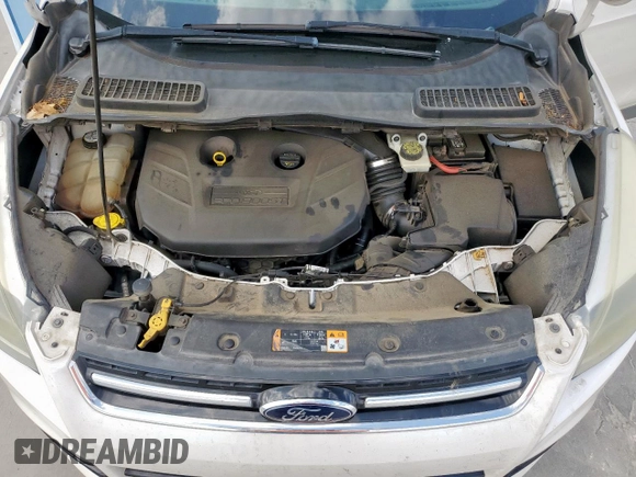 2013 Ford Escape Titanium z VIN 1FMCU0J90DUC13426, wystawiony jako Copart lot #53643565 z przebiegiem 176 600 mil mil oraz Szkoda całkowita • Salvage title. Historia ofert i sprzedaży dostępna na DreamBid. Obrazek 12.