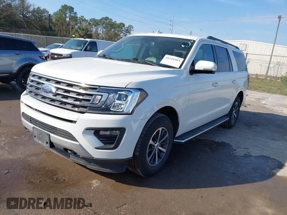2021 Ford Expedition Max XLT with VIN 1FMJK1JT3MEA38310, listed as a IAAI auction lot 41511993 with 64,786 mi miles and . Bid and sale history available at DreamBid. Image 2.