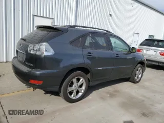 2007 Lexus RX 400h z VIN JTJGW31U972002681, wystawiony jako Copart lot #78883974 z przebiegiem 288 019 mil mil oraz Szkody całkowita. Historia ofert i sprzedaży dostępna na DreamBid. Obrazek 3.