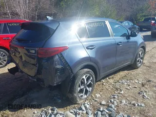 2020 Kia Sportage LX with VIN KNDPM3AC2L7656080, listed as a IAAI auction lot 41880254 with 34,023 mi miles and . Bid and sale history available at DreamBid. Image 4.