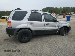 2003 Ford Escape XLS Popular with VIN 1FMYU02173KB43156, listed as a Copart auction lot 51534495 with 266,600 mi miles and Salvage title. Bid and sale history available at DreamBid. Image 3.
