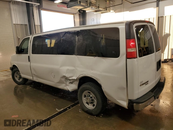 2013 Chevrolet Express Passenger LT with VIN 1GAZG1FG5D1118406, listed as a Copart auction lot 81705434 with 87,326 mi miles and Salvage title. Bid and sale history available at DreamBid. Image 2.