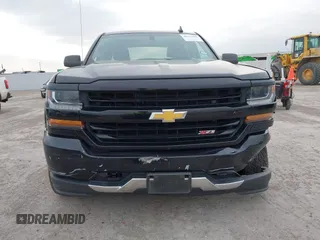 2017 Chevrolet Silverado 1500 LT with VIN 1GCUKREC2HF208232, listed as a IAAI auction lot 40933445 with 105,928 mi miles and . Bid and sale history available at DreamBid. Image 12.