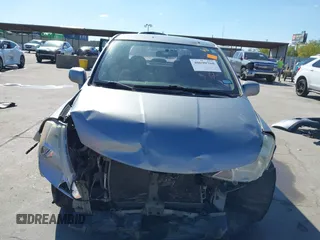 2010 Nissan Versa S with VIN 3N1BC1AP2AL394996, listed as a IAAI auction lot 40690760 with 125,972 mi miles and . Bid and sale history available at DreamBid. Image 6.