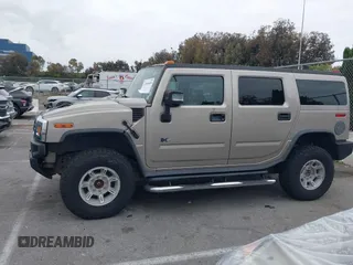 2005 Hummer H2 SUV with VIN 5GRGN23U95H129470, listed as a IAAI auction lot 42046654 with 63,489 mi miles. Bid and sale history available at carsss.com. Image 14.