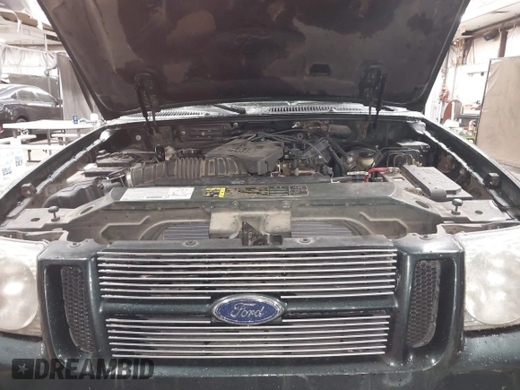 2003 Ford Explorer Sport Trac XLS z VIN 1FMZU77E73UB07352, wystawiony jako IAAI lot #41803900 z przebiegiem 153 433 mil mil oraz . Historia ofert i sprzedaży dostępna na DreamBid. Obrazek 10.