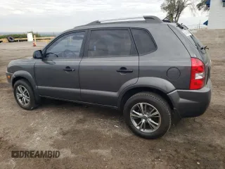 2007 Hyundai Tucson GLS with VIN KM8JM12B27U614351, listed as a Copart auction lot 69491404 with 127,278 mi miles and Salvage Title. Bid and sale history available at carsss.com. Image 2.