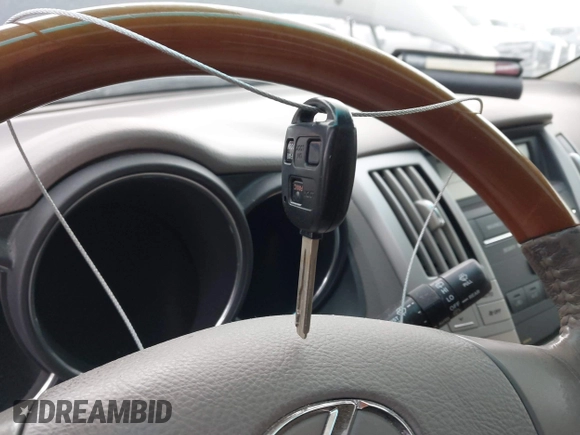 2008 Lexus RX 350 z VIN 2T2GK31U58C041345, wystawiony jako IAAI lot #41731379 z przebiegiem Nie podano mil oraz . Historia ofert i sprzedaży dostępna na DreamBid. Obrazek 11.