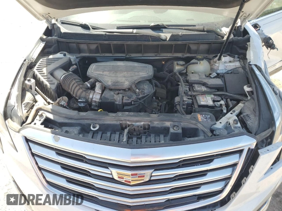 2018 Cadillac XT5 Premium Luxury FWD z VIN 1GYKNERS6JZ102163, wystawiony jako Copart lot #52817895 z przebiegiem 167 570 mil mil oraz Nie do naprawy. Historia ofert i sprzedaży dostępna na DreamBid. Obrazek 13.