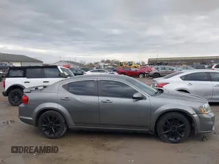 2013 Dodge Avenger SXT with VIN 1C3CDZCB7DN746154, listed as a IAAI auction lot 41834458 with 161,906 mi miles and . Bid and sale history available at DreamBid. Image 13.