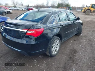 2013 Chrysler 200 Touring with VIN 1C3CCBBB7DN656174, listed as a IAAI auction lot 41817135 with 142,156 mi miles and . Bid and sale history available at carsss.com. Image 4.