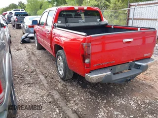 2010 GMC Canyon SLE1 z VIN 1GTDSCDE0A8137817, wystawiony jako IAAI lot #42178917 z przebiegiem 208 192 mil mil oraz . Historia ofert i sprzedaży dostępna na DreamBid. Obrazek 3.