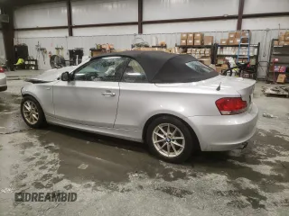 2011 BMW 1 Series 128i with VIN WBAUL7C52BVM80814, listed as a Copart auction lot 45150975 with 186,716 mi miles and Salvage title. Bid and sale history available at DreamBid. Image 2.