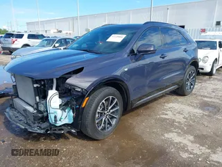 2024 Cadillac XT4 FWD Sport with VIN 1GYFZER40RF226384, listed as a IAAI auction lot 42220804 with 8,743 mi miles and . Bid and sale history available at DreamBid. Image 2.