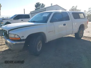 1998 Dodge Dakota SLT with VIN 1B7GG22Y6WS558179, listed as a IAAI auction lot 41673558 with 252,084 mi miles. Bid and sale history available at carsss.com. Image 2.