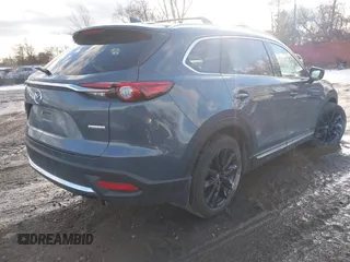 2022 Mazda CX-9 Grand Touring with VIN JM3TCBDYXN0618313, listed as a IAAI auction lot 41452750 with 34,356 mi miles and . Bid and sale history available at DreamBid. Image 4.