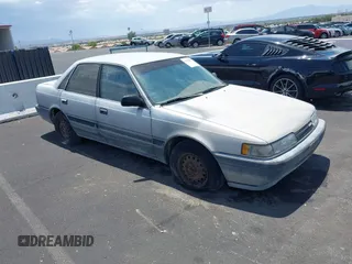 1988 Mazda 626 z VIN JM1GD2221J1550574, wystawiony jako IAAI lot #42415062 z przebiegiem 190 747 mil mil oraz . Historia ofert i sprzedaży dostępna na DreamBid. Obrazek 1.