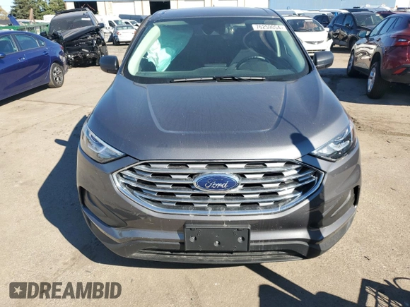 2021 Ford Edge SE z VIN 2FMPK4G98MBA23711, wystawiony jako Copart lot #76259054 z przebiegiem 20 879 mil mil oraz Czysty tytuł • Clean title. Historia ofert i sprzedaży dostępna na DreamBid. Obrazek 5.