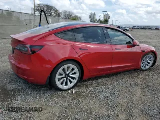2022 Tesla Model 3 z VIN 5YJ3E1EA5NF155772, wystawiony jako Copart lot #50805725 z przebiegiem 73 491 mil mil oraz Szkoda całkowita • Salvage title. Historia ofert i sprzedaży dostępna na DreamBid. Obrazek 3.