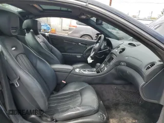 2009 Mercedes-Benz SL 55/63 AMG with VIN WDBSK70F79F157839, listed as a Copart auction lot 52350295 with 79,670 mi miles and Salvage title. Bid and sale history available at DreamBid. Image 7.