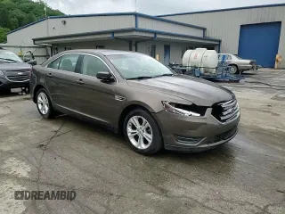 2015 Ford Taurus SEL z VIN 1FAHP2E84FG102075, wystawiony jako Copart lot #59740265 z przebiegiem 90 669 mil mil oraz Szkoda całkowita • Salvage title. Historia ofert i sprzedaży dostępna na DreamBid. Obrazek 13.