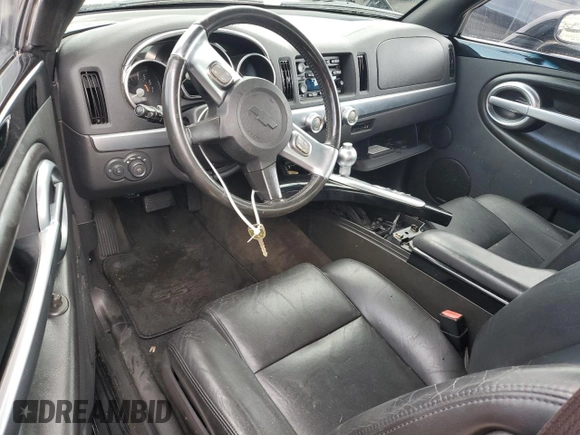 2003 Chevrolet SSR LS z VIN 1GCES14P73B101557, wystawiony jako Copart lot #73679984 z przebiegiem 107 554 mil mil oraz Szkoda całkowita • Salvage title. Historia ofert i sprzedaży dostępna na DreamBid. Obrazek 8.