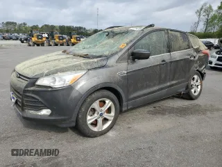 2015 Ford Escape SE with VIN 1FMCU9GXXFUC72335, listed as a Copart auction lot 51114735 with 157,471 mi miles and Salvage Title. Bid and sale history available at DreamBid. Image 1.