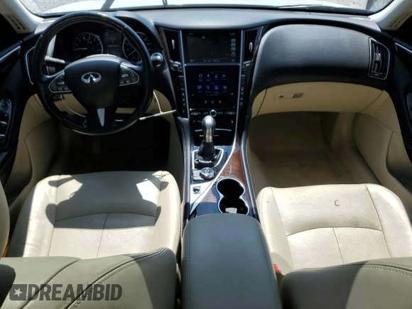 2015 Infiniti Q50 Premium with VIN JN1BV7AR9FM392349, listed as a Copart auction lot 59121255 with 104,199 mi miles and Salvage title. Bid and sale history available at DreamBid. Image 8.