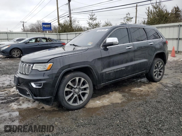 2017 Jeep Grand Cherokee Overland with VIN 1C4RJFCGXHC927470, listed as a Copart auction lot 45132185 with 119,543 mi miles and Salvage Title. Bid and sale history available at carsss.com. Image 1.