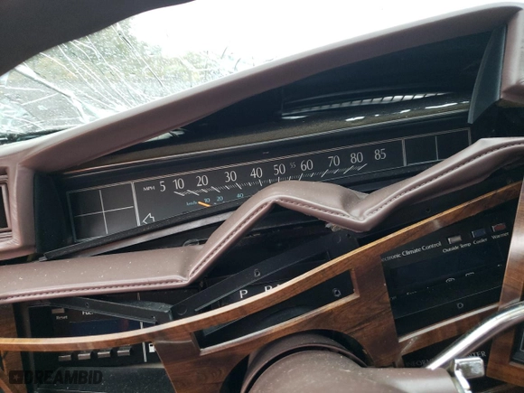 1989 Cadillac DeVille with VIN 1G6CD5157K4371390, listed as a Copart auction lot 72955004 with NaN miles and Salvage Title. Bid and sale history available at carsss.com. Image 9.