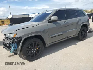 2019 Jeep Grand Cherokee Altitude with VIN 1C4RJEAG8KC716112, listed as a Copart auction lot 59031015 with 124,962 mi miles and Salvage title. Bid and sale history available at DreamBid. Image 1.