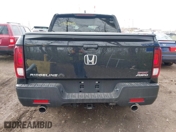 2021 Honda Ridgeline Sport with VIN 5FPYK3F19MB017134, listed as a IAAI auction lot 41942440 with 30,794 mi miles and . Bid and sale history available at DreamBid. Image 16.