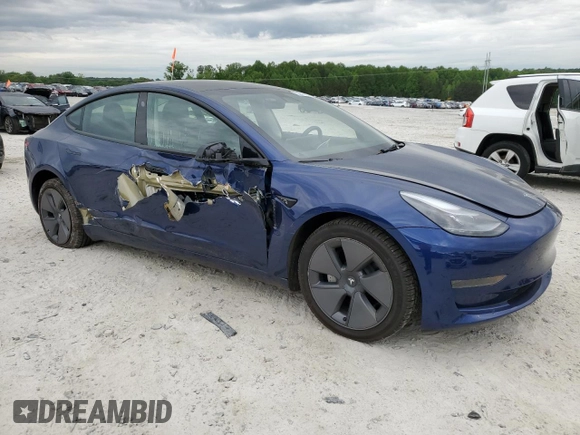 2023 Tesla Model 3 with VIN 5YJ3E1EA3PF474350, listed as a Copart auction lot 53819035 with 32,714 mi miles and Salvage Title. Bid and sale history available at DreamBid. Image 4.