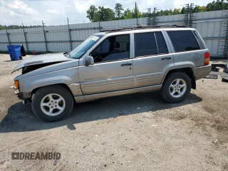 1998 Jeep Grand Cherokee Limited with VIN 1J4GZ88Z9WC148445, listed as a Copart auction lot 65961744 with 180,067 mi miles and Clean Title. Bid and sale history available at carsss.com. Image 1.