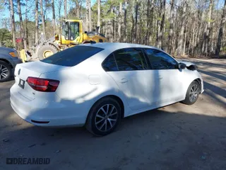 2016 Volkswagen Jetta Sedan 1.4T SE w/Connectivity with VIN 3VWD67AJ8GM409674, listed as a IAAI auction lot 41835611 with 154,602 mi miles. Bid and sale history available at carsss.com. Image 4.