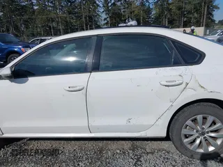 2012 Volkswagen Passat S with VIN 1VWAH7A33CC020242, listed as a IAAI auction lot 42034882 with 188,488 mi miles and . Bid and sale history available at DreamBid. Image 14.