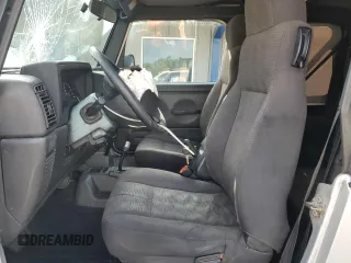 2004 Jeep Wrangler X with VIN 1J4FA39S74P763492, listed as a Copart auction lot 54664095 with 168,493 mi miles and Salvage Title. Bid and sale history available at DreamBid. Image 7.