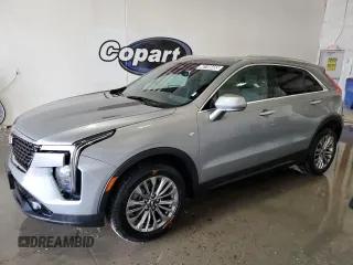 2024 Cadillac XT4 FWD Premium Luxury z VIN 1GYFZCR49RF126367, wystawiony jako Copart lot #60196465 z przebiegiem 40 827 mil mil oraz Czysty tytuł • Clean title. Historia ofert i sprzedaży dostępna na DreamBid. Obrazek 1.