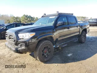 2023 Toyota Tacoma SR with VIN 3TMCZ5AN0PM595594, listed as a Copart auction lot 47178295 with 42,693 mi miles and Salvage title. Bid and sale history available at DreamBid. Image 1.